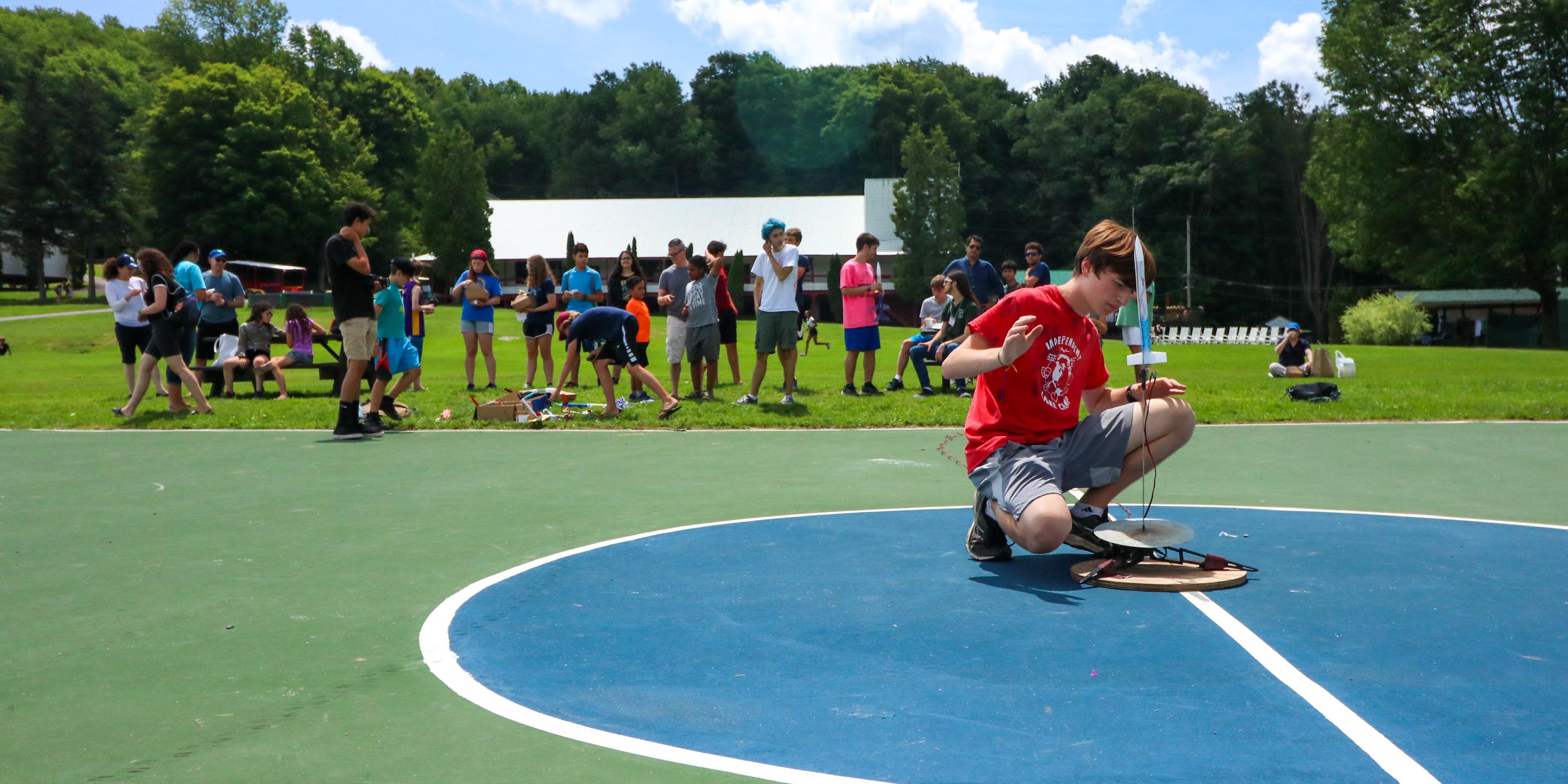 Boy launches rocket at summer camp