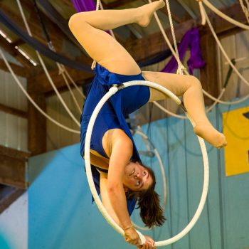 Camper does acrobatics on circus hoop