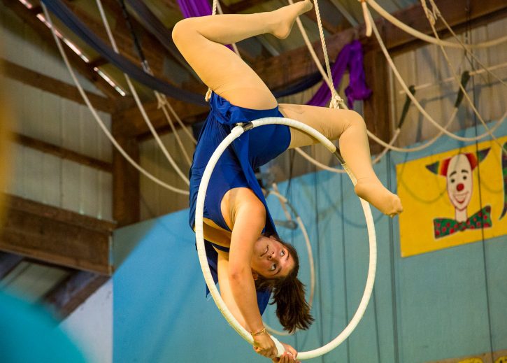 Camper does acrobatics on circus hoop