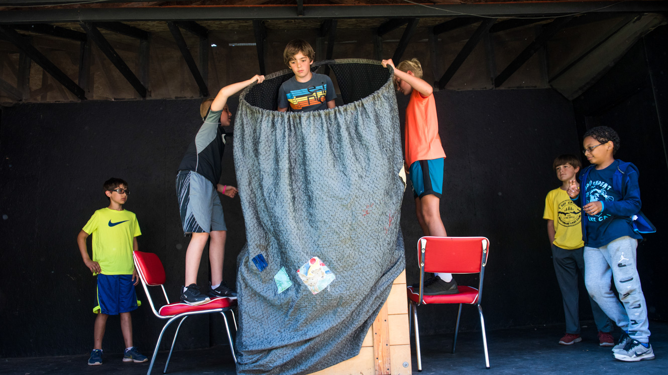 Campers perform in magic show